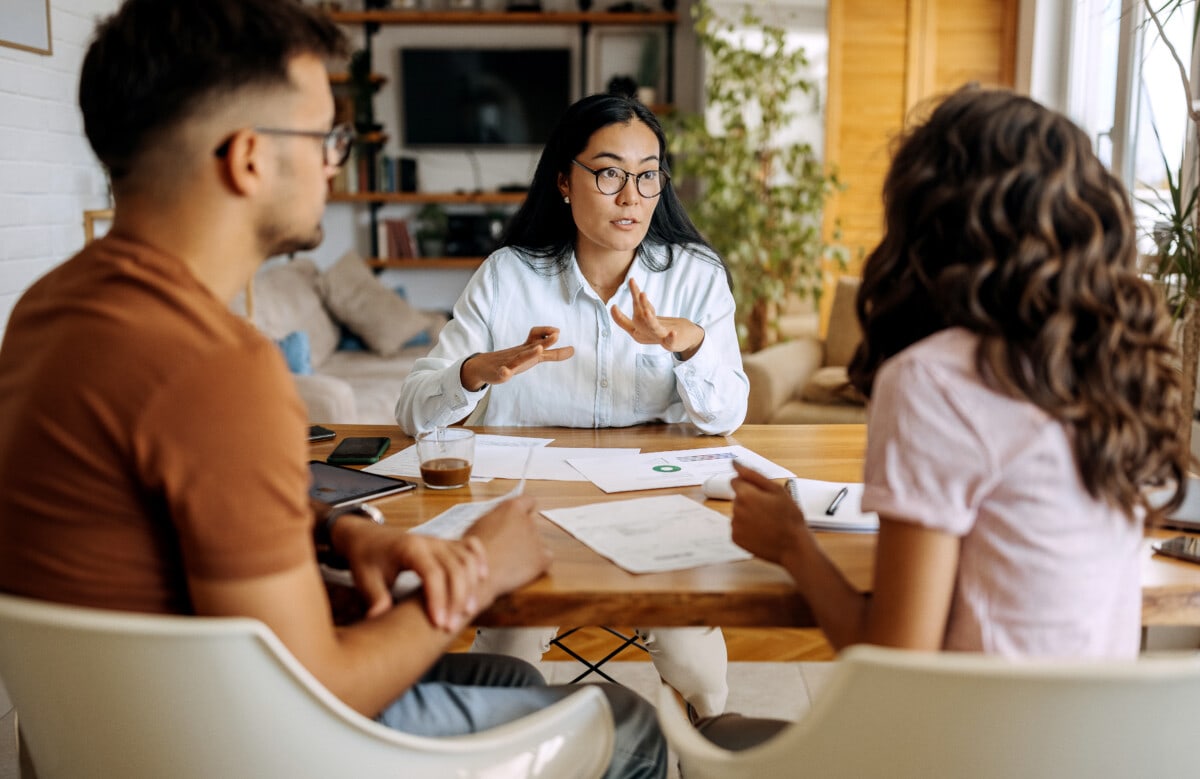 Couple getting advice from financial expert