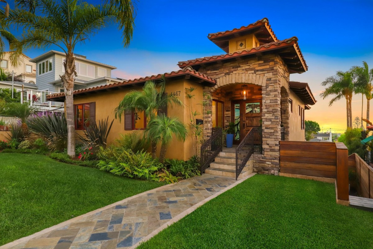 brick and beige mediterranean style house with italian renaissance architecture