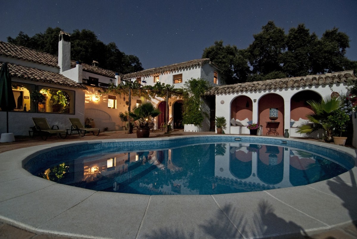 mediterranean backyard modern style home with grand arches