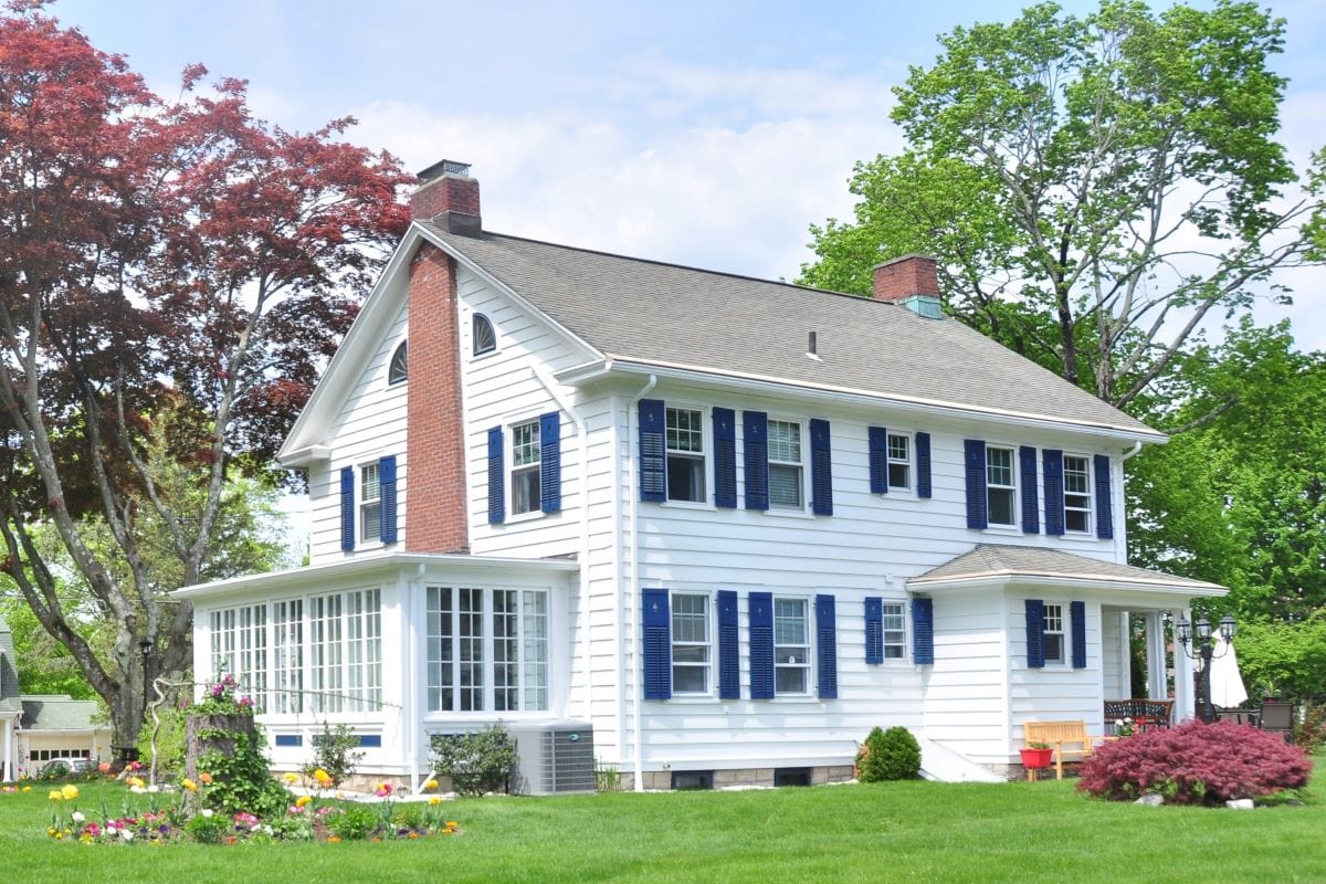 house with window shutters for curb appeal
