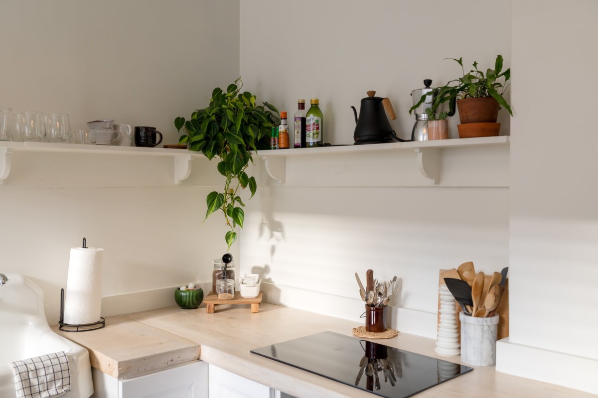 kitchenette with wood countertop and hot plate