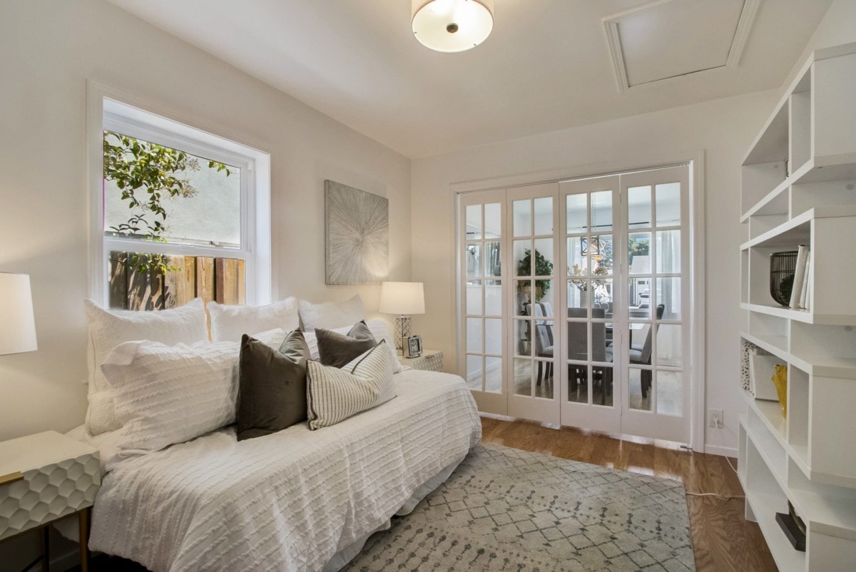 minimalist cozy room with day bed and books