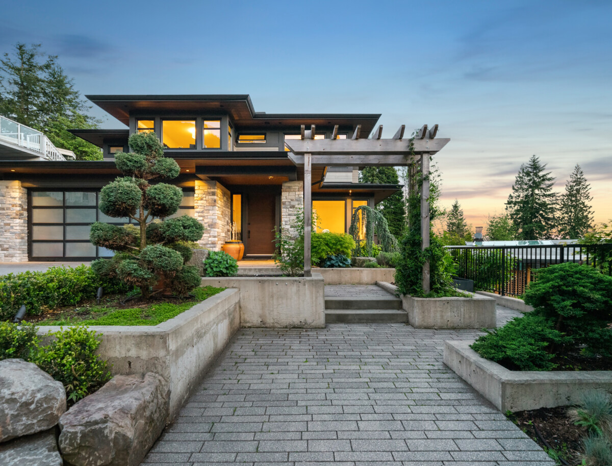 modern home with brick walkway
