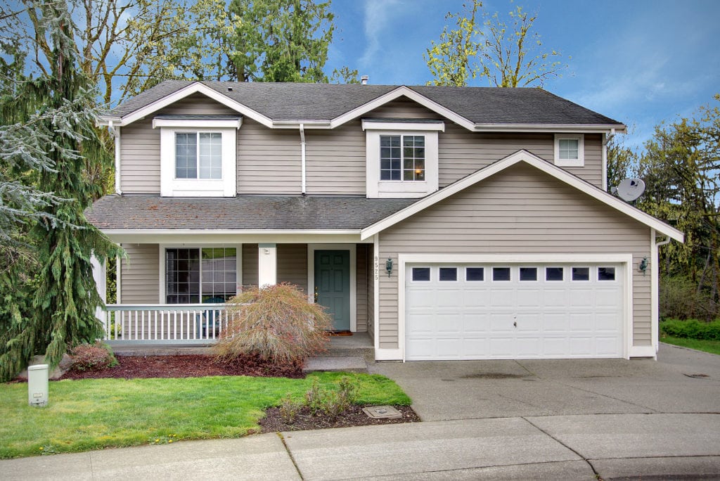 Common style home in wooded area