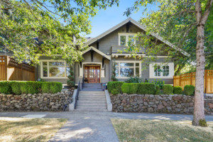 Home in Portland, Oregon painted sage green with white trim